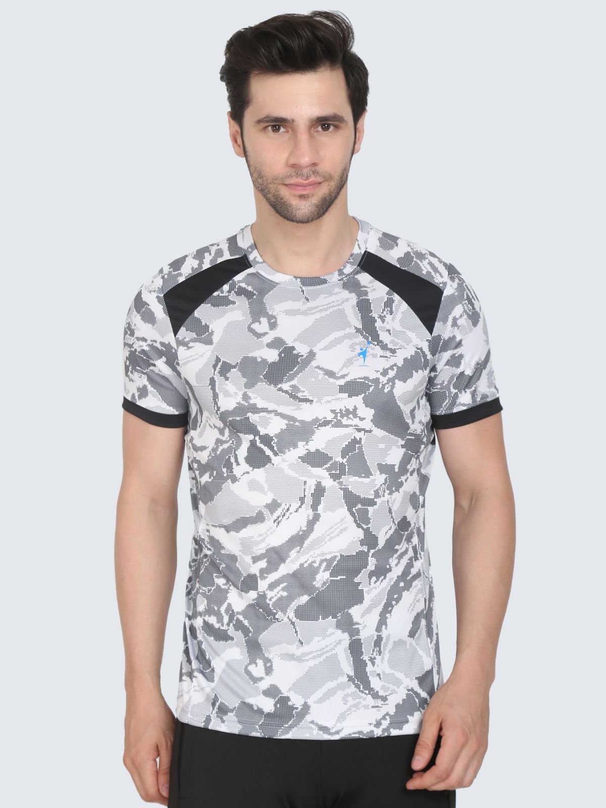 Front view of white camo T-shirt with black shoulder panels on a white background with NDR SPORT logo