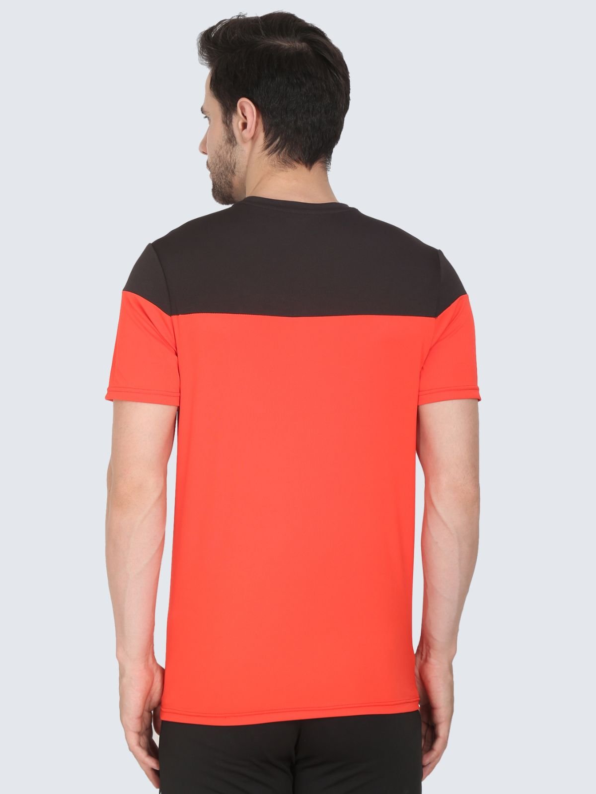 Back view of tomato red ClubSpirit T-shirt with black yoke on a white background