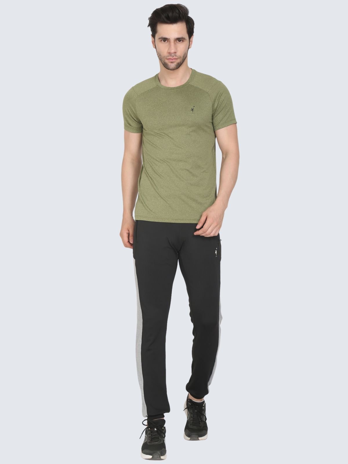 Full-body male model wearing olive athletic Cool N Comfort T-shirt on a white background