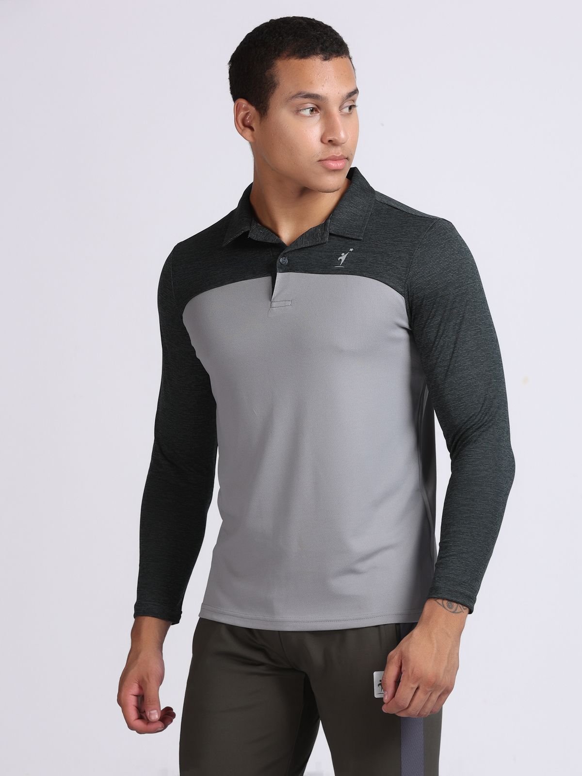 Three-quarter view of a light grey and dark grey long-sleeve polo T-shirt SwanTech athletic top.