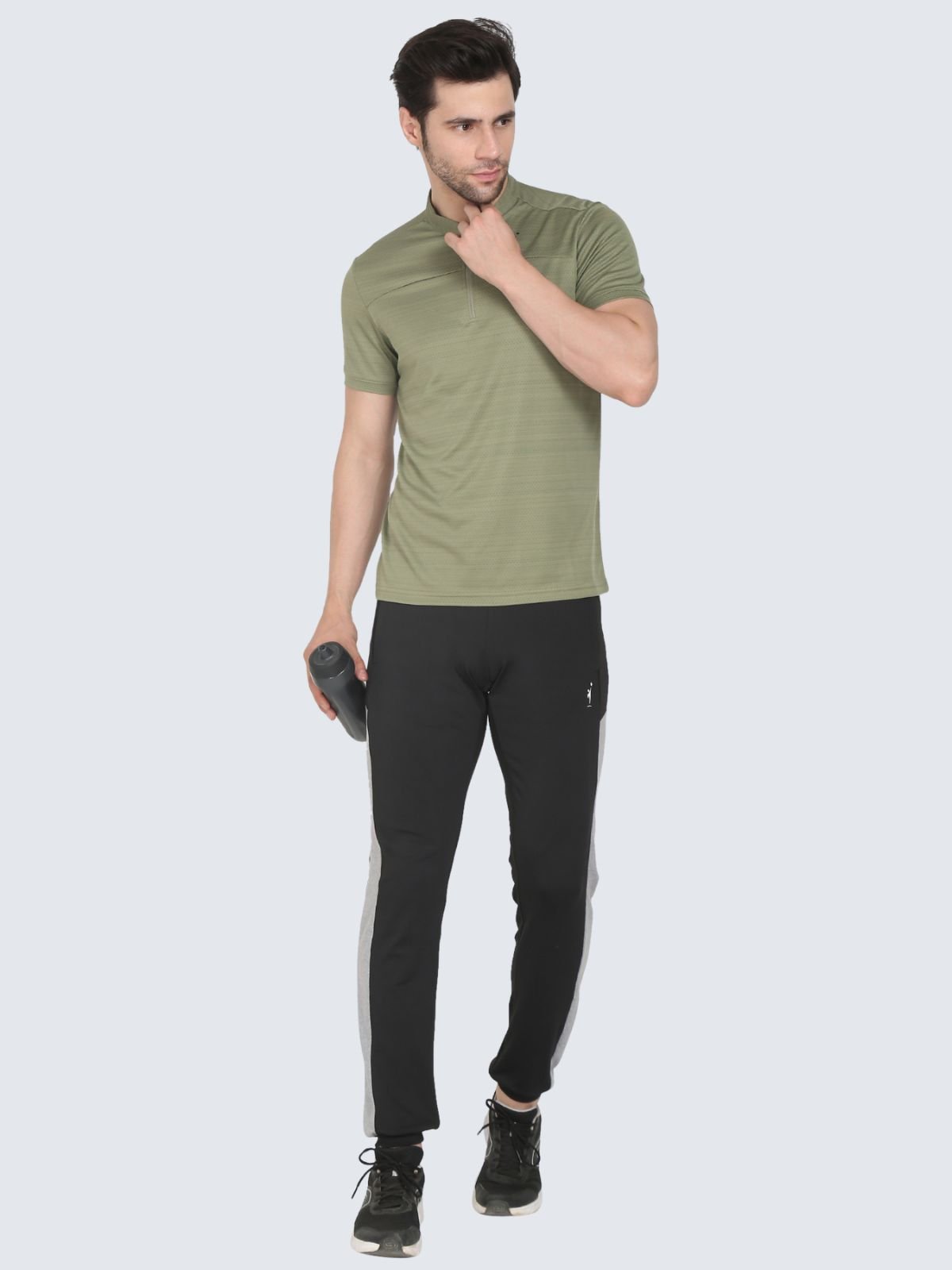 Men's olive half-zip textured athletic T-shirt, full-length view
