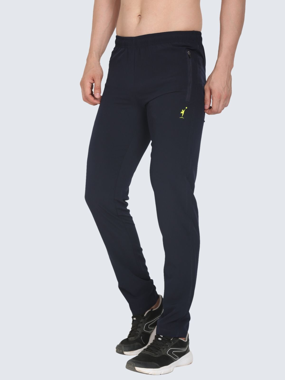 Three-quarter side view of Lite Plain navy athletic pants with NDR SPORT logo on a white background