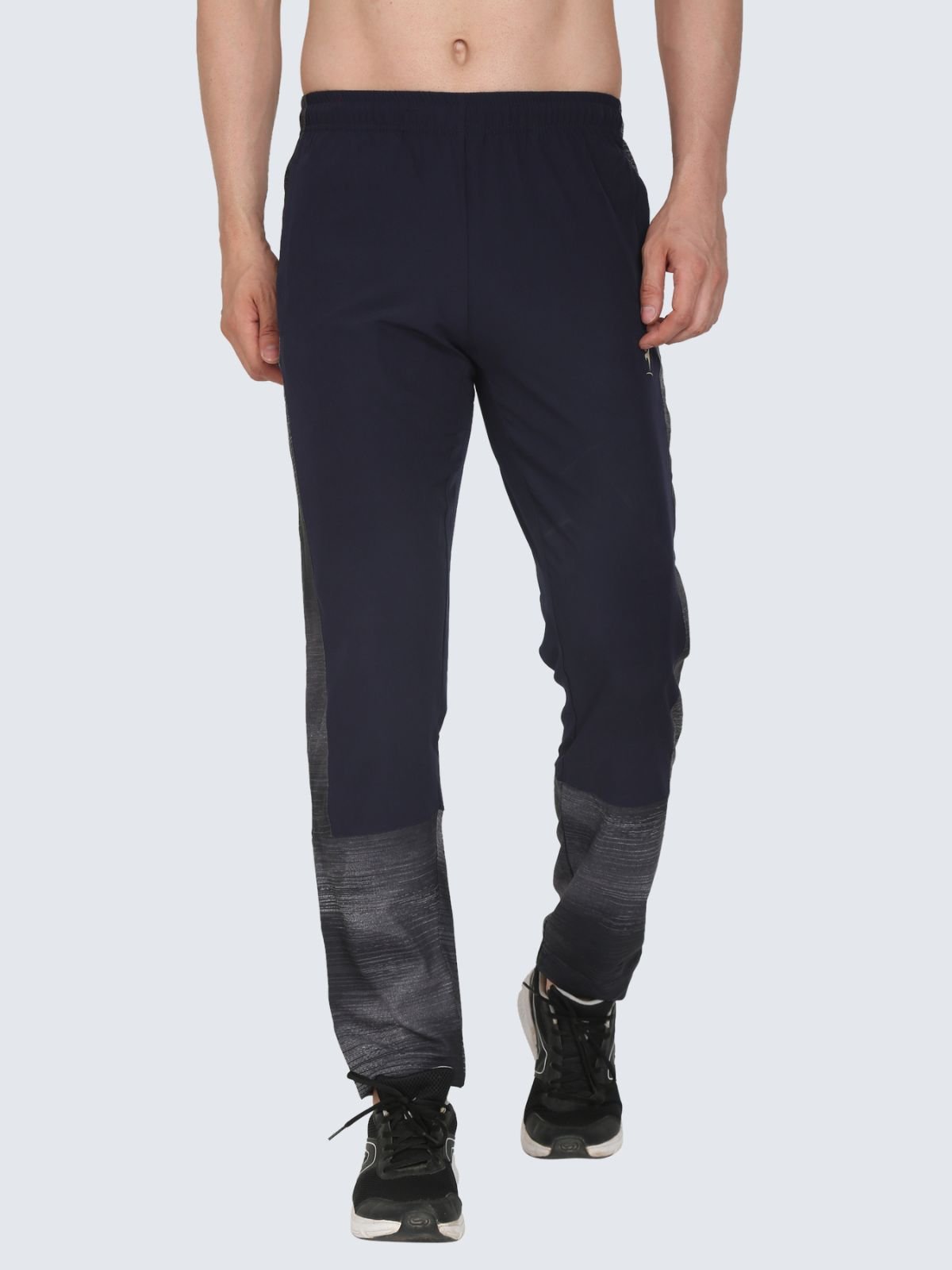 Front view of Lite Subly navy athletic pants with grey gradient lower panels from waist to ankles on a white background