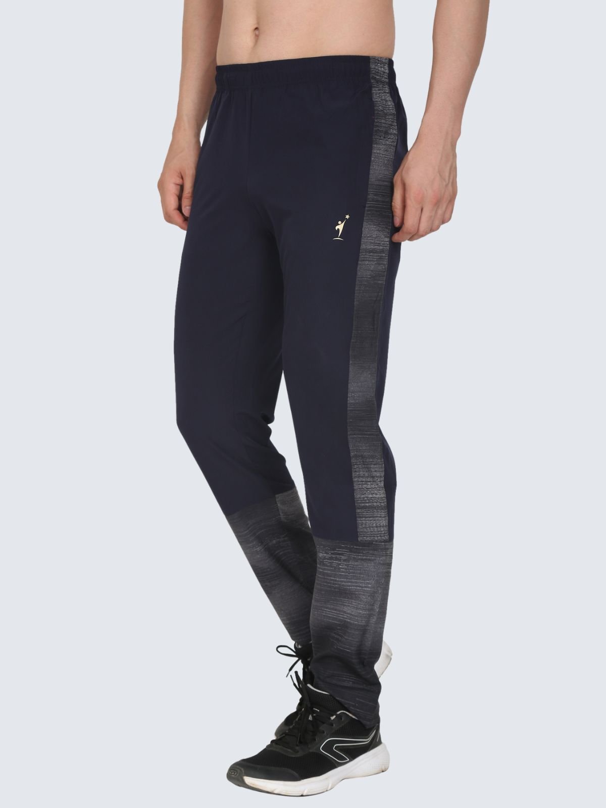 Three-quarter side view of Lite Subly navy athletic pants with grey gradient side and lower panels on a white background with NDR SPORT Logo
